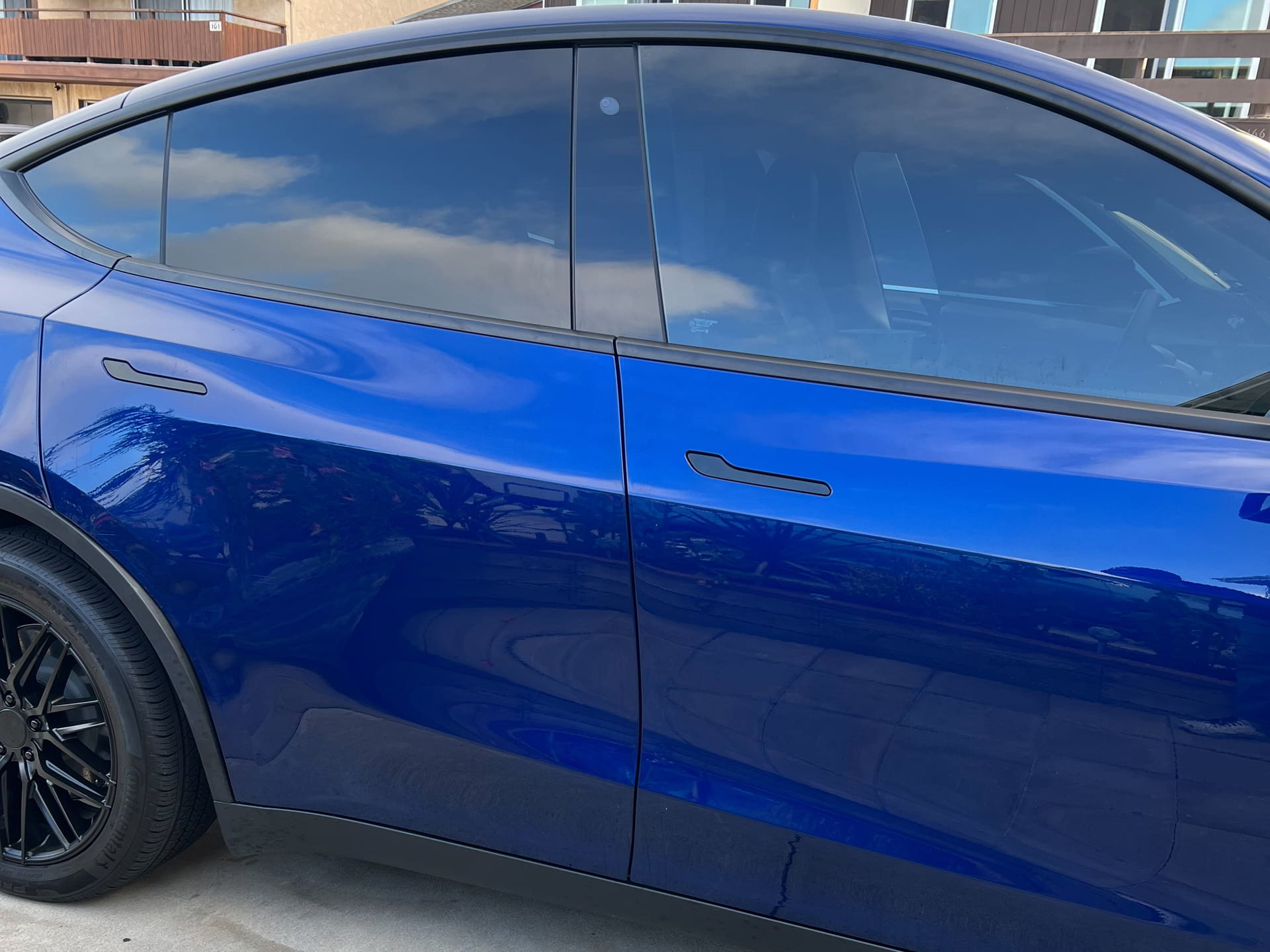 blue car side body paint correction supreme detail and tint encinitas ca